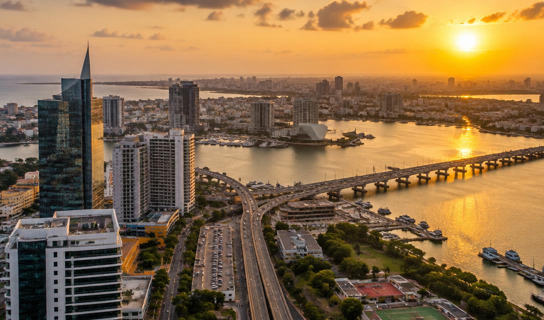 Aerial view of a West African city skyline at golden hour